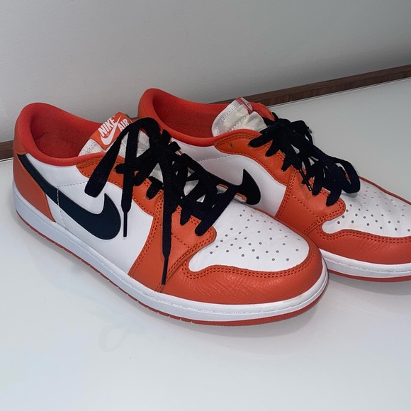 nike black and orange sneakers